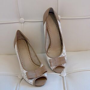Adrienne Vittadini peep-toes.  Very cute shoes in good used condition. 8.5M.
